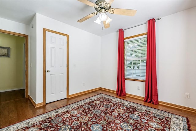 16101 Hickory Dr, Rogers, AR 72756 - unfurnished room with wood finished floors and ceiling fan