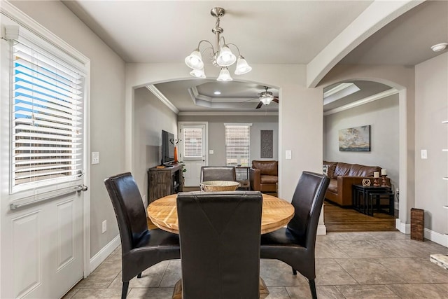 3900 SW Capstone Ave, Bentonville, AR 72712 - dining room with arched walkways, ornamental molding, ceiling fan, and a tray ceiling