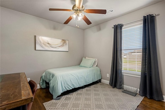 3900 SW Capstone Ave, Bentonville, AR 72712 - bedroom featuring wood finished floors and a ceiling fan