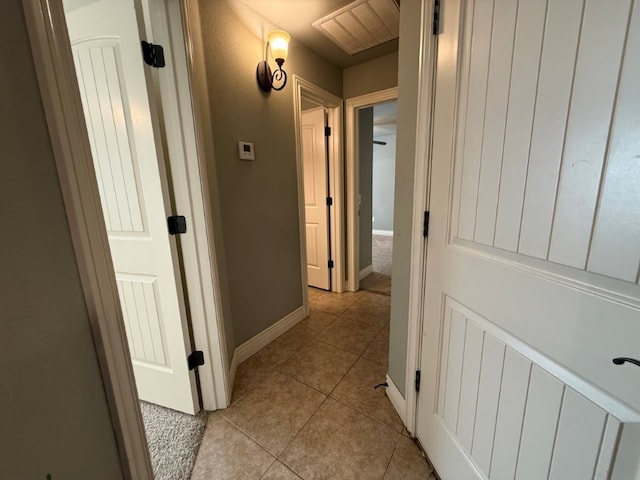 3115 SW Warberry Ave, Bentonville, AR 72713 - corridor featuring light tile patterned floors and baseboards
