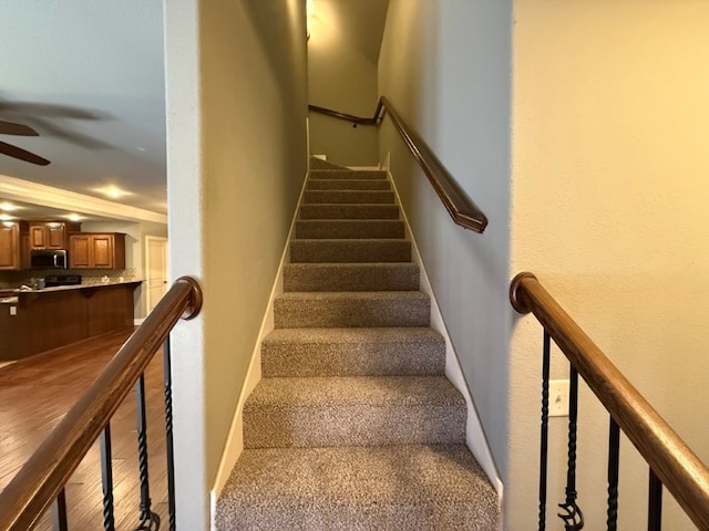 3115 SW Warberry Ave, Bentonville, AR 72713 - stairs featuring ceiling fan