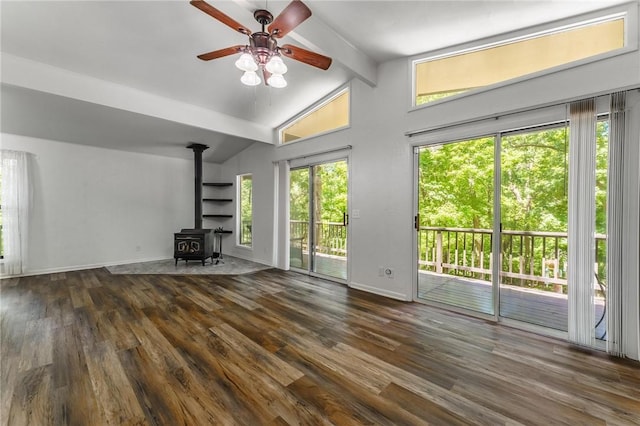 4 Orr Ln, Bella Vista, AR 72715 - unfurnished living room featuring a wood stove, ceiling fan, and wood finished floors