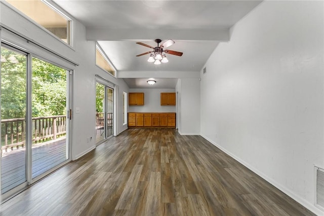 4 Orr Ln, Bella Vista, AR 72715 - unfurnished living room with dark wood-style flooring and a ceiling fan