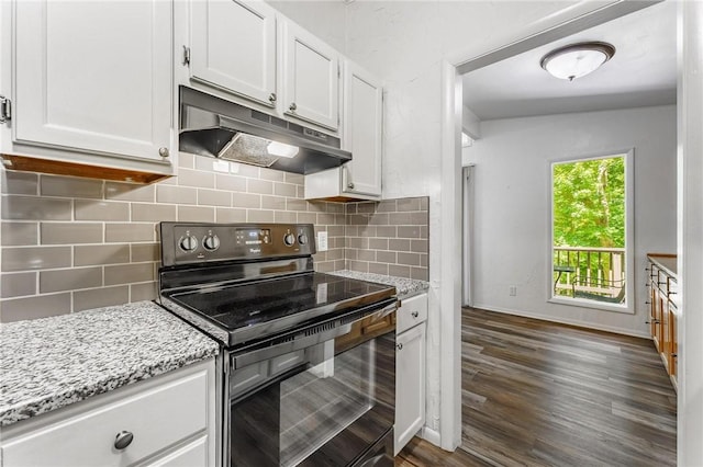 4 Orr Ln, Bella Vista, AR 72715 - kitchen featuring black range with electric cooktop, under cabinet range hood, white cabinetry, light stone countertops, and dark wood finished floors