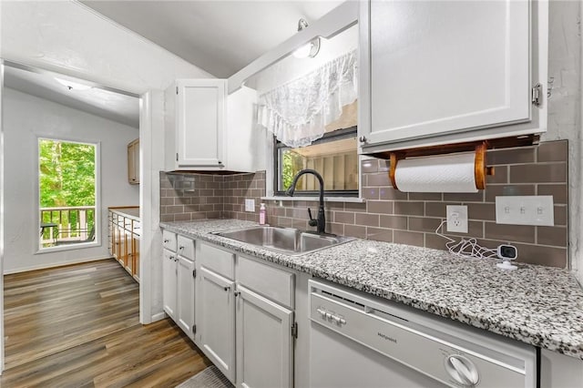 4 Orr Ln, Bella Vista, AR 72715 - kitchen with dishwasher, white cabinets, lofted ceiling, wood finished floors, and tasteful backsplash