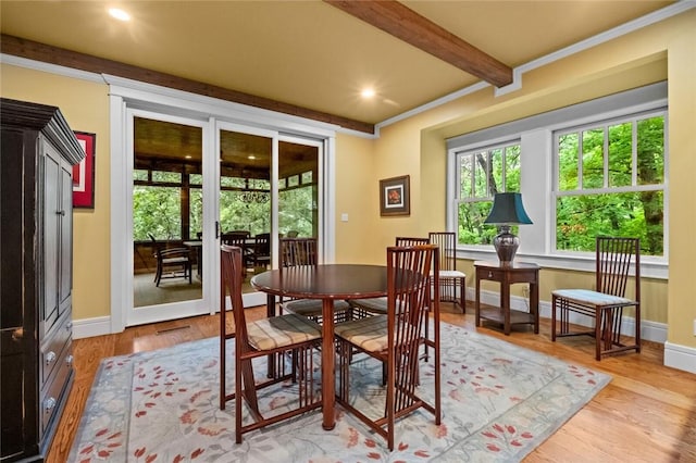 150 Jackson Cove Cres, Eureka Springs, AR 72631 - dining space featuring light wood finished floors, beamed ceiling, recessed lighting, and crown molding