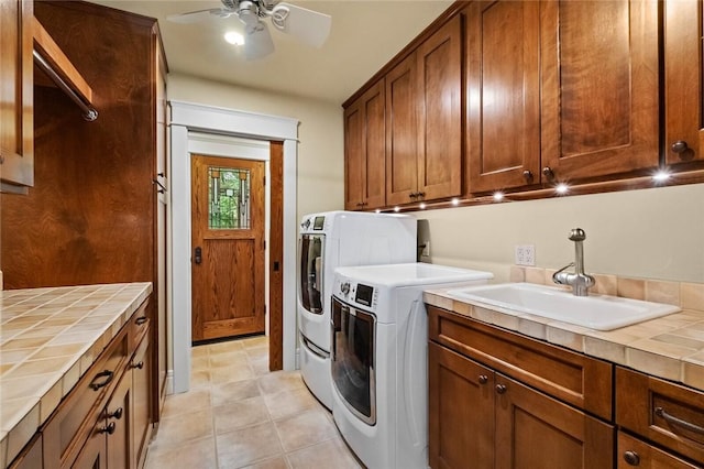 150 Jackson Cove Cres, Eureka Springs, AR 72631 - washroom with cabinet space, washer and dryer, ceiling fan, and light tile patterned floors