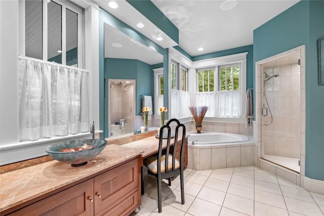 150 Jackson Cove Cres, Eureka Springs, AR 72631 - bathroom with a garden tub, vanity, tiled shower, tile patterned flooring, and recessed lighting