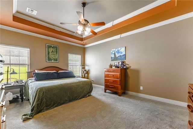 216 Windsor Ave, Lowell, AR 72745 - carpeted bedroom with a tray ceiling, ornamental molding, and ceiling fan