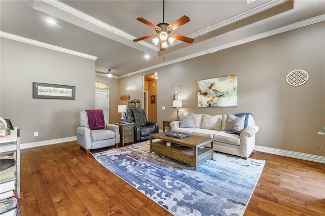216 Windsor Ave, Lowell, AR 72745 - living area with a ceiling fan, a raised ceiling, hardwood / wood-style flooring, and crown molding