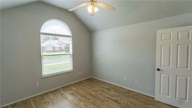 404 NE Whitney St, Bentonville, AR 72712 - empty room featuring plenty of natural light, wood finished floors, lofted ceiling, and ceiling fan