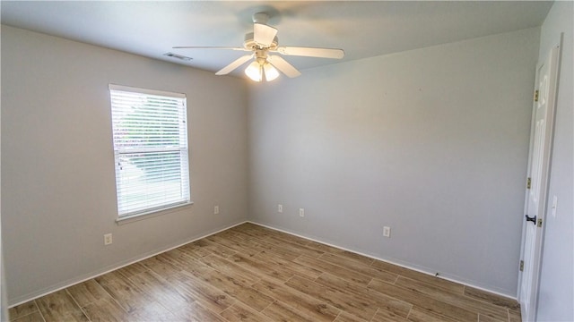 404 NE Whitney St, Bentonville, AR 72712 - unfurnished room featuring light wood-style floors and ceiling fan