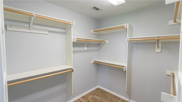 404 NE Whitney St, Bentonville, AR 72712 - walk in closet with wood finished floors