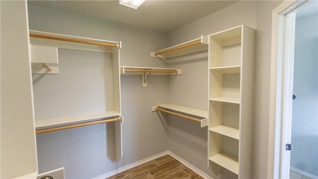 404 NE Whitney St, Bentonville, AR 72712 - walk in closet with wood finished floors