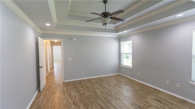 404 NE Whitney St, Bentonville, AR 72712 - empty room featuring a raised ceiling, crown molding, ceiling fan, wood finished floors, and recessed lighting