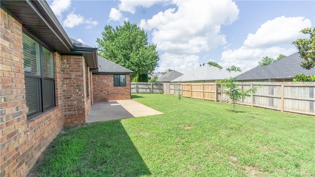 404 NE Whitney St, Bentonville, AR 72712 - fenced backyard with a patio