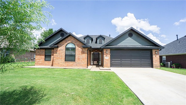 404 NE Whitney St, Bentonville, AR 72712 - view of front facade with a garage, brick siding, driveway, and a front yard