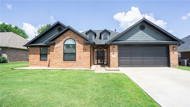 404 NE Whitney St, Bentonville, AR 72712 - ranch-style home featuring brick siding, driveway, an attached garage, a front yard, and roof with shingles