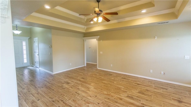 404 NE Whitney St, Bentonville, AR 72712 - unfurnished room with a raised ceiling, crown molding, ceiling fan, light wood-style flooring, and recessed lighting