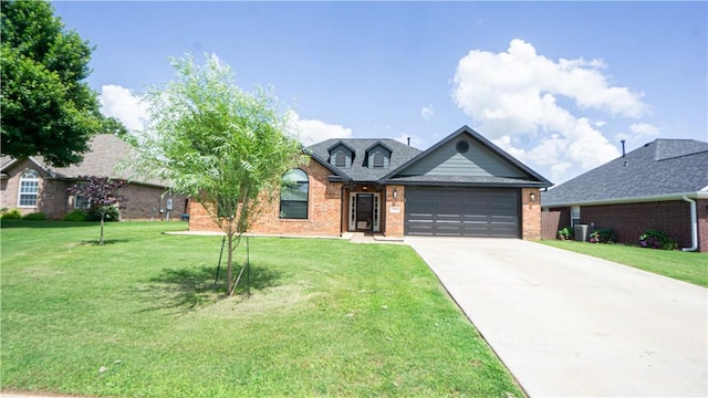 404 NE Whitney St, Bentonville, AR 72712 - view of front facade featuring brick siding, an attached garage, driveway, and a front yard