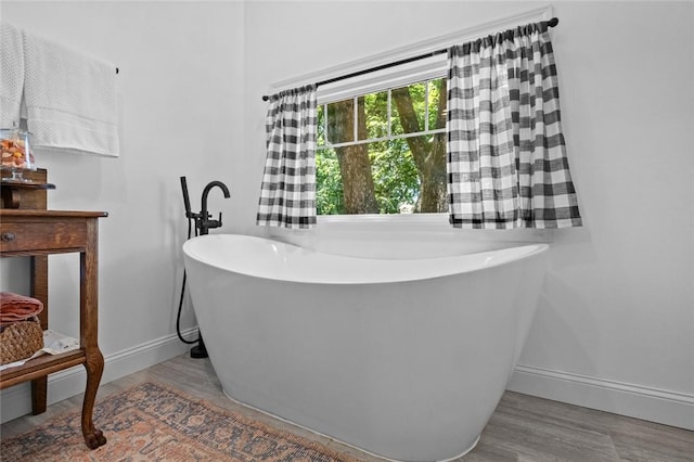 1330 S Curtis Ave, Pea Ridge, AR 72751 - full bath featuring a soaking tub and wood finished floors