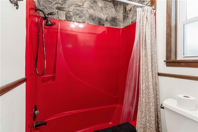 8173 Spanker Creek Rd, Bentonville, AR 72712 - full bathroom featuring shower / bath combo with shower curtain and wainscoting