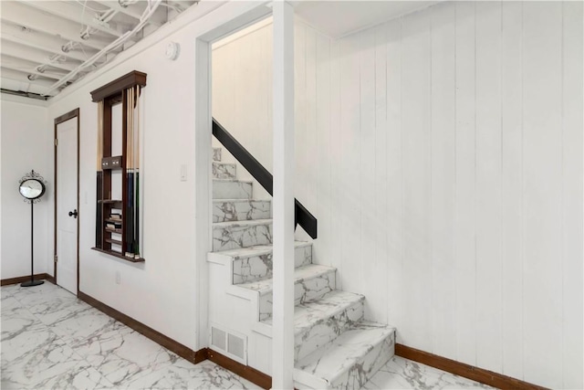 8173 Spanker Creek Rd, Bentonville, AR 72712 - stairs featuring marble finish flooring and baseboards