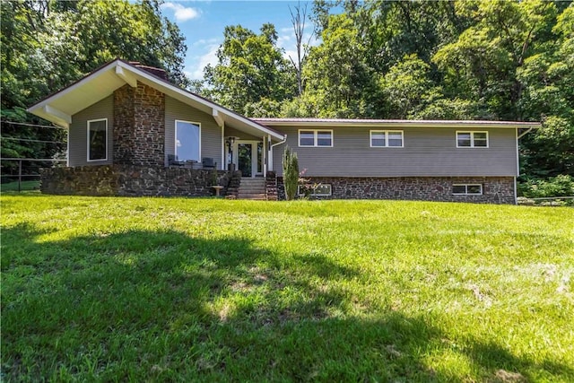 8173 Spanker Creek Rd, Bentonville, AR 72712 - view of front of home featuring a front lawn and a chimney