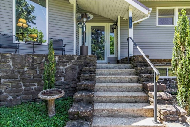 8173 Spanker Creek Rd, Bentonville, AR 72712 - doorway to property with stone siding and covered porch
