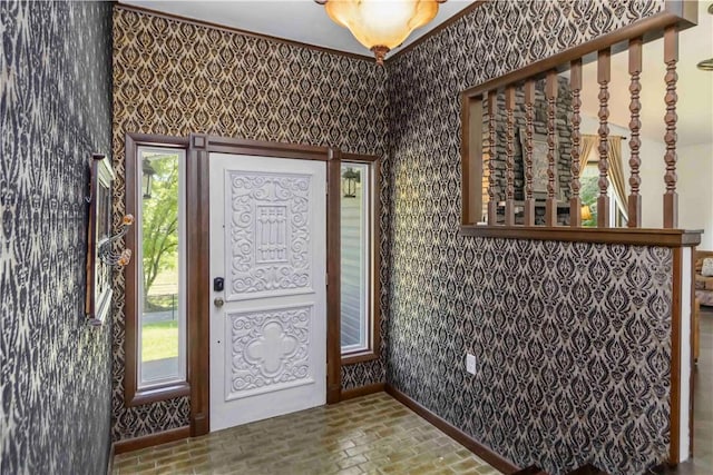 8173 Spanker Creek Rd, Bentonville, AR 72712 - entrance foyer featuring brick floors and wallpapered walls
