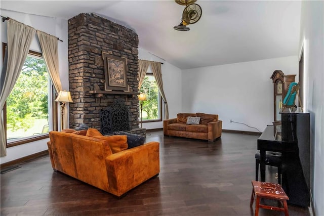 8173 Spanker Creek Rd, Bentonville, AR 72712 - living area featuring lofted ceiling, a fireplace, and wood finished floors