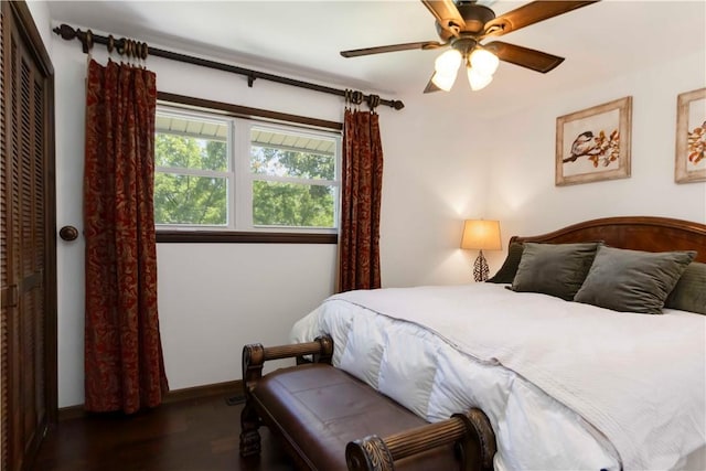 8173 Spanker Creek Rd, Bentonville, AR 72712 - bedroom with wood finished floors and a ceiling fan