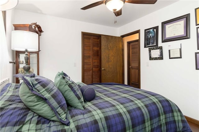 8173 Spanker Creek Rd, Bentonville, AR 72712 - bedroom with a closet and ceiling fan
