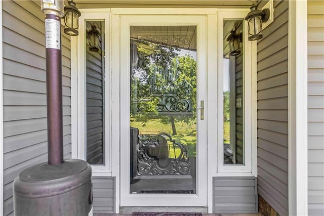 8173 Spanker Creek Rd, Bentonville, AR 72712 - doorway to property featuring a porch