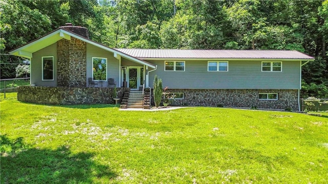 8173 Spanker Creek Rd, Bentonville, AR 72712 - raised ranch featuring a chimney and a metal roof