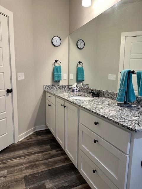 26 Osborne Dr, Bella Vista, AR 72715 - bathroom with vanity and wood finished floors