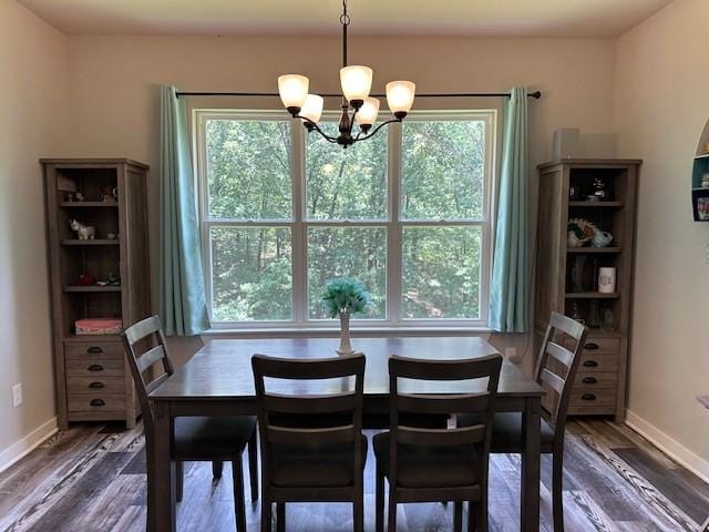 26 Osborne Dr, Bella Vista, AR 72715 - dining area with a chandelier, plenty of natural light, and dark wood-style floors