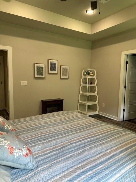 26 Osborne Dr, Bella Vista, AR 72715 - bedroom featuring baseboards and dark wood-style flooring