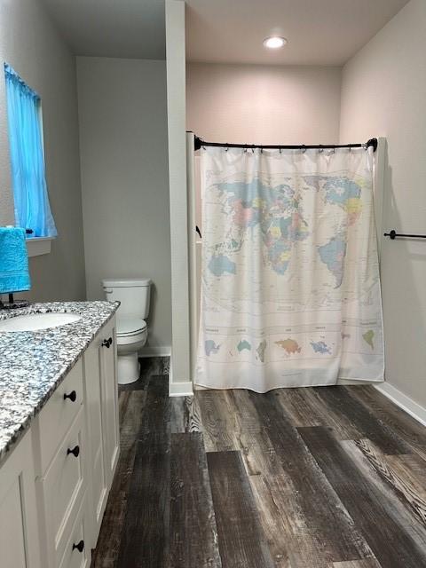 26 Osborne Dr, Bella Vista, AR 72715 - full bath featuring wood finished floors, vanity, and recessed lighting
