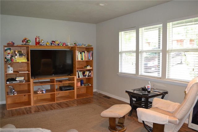 6 Hampstead Ln, Bella Vista, AR 72714 - living room featuring wood finished floors and baseboards