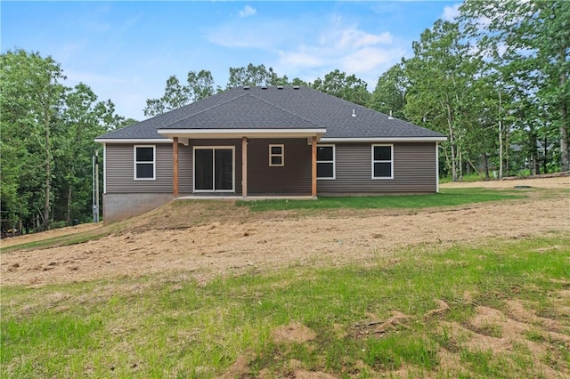 53 Belgravia Dr, Bella Vista, AR 72715 - back of house with a lawn and a shingled roof