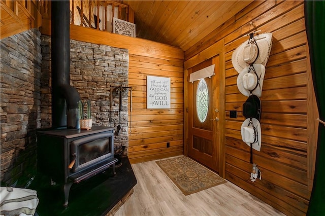 16175 N Cove Creek Wc 21 Rd, Prairie Grove, AR 72753 - entryway with a wood stove, wood finished floors, wooden ceiling, and wooden walls