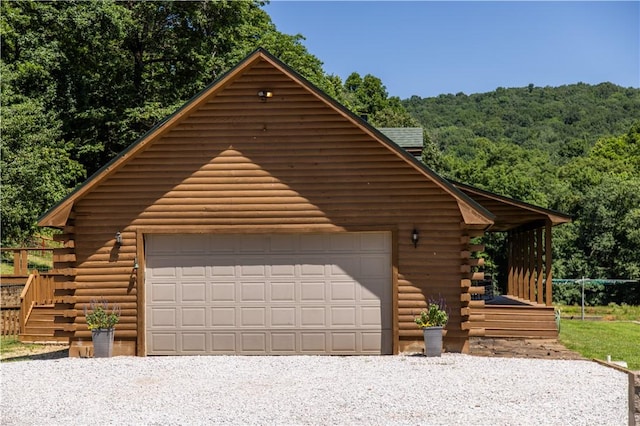 16175 N Cove Creek Wc 21 Rd, Prairie Grove, AR 72753 - log cabin featuring log siding, an outbuilding, and a wooded view