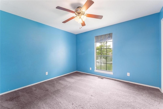 1206 Tru Ln, Rogers, AR 72756 - unfurnished room featuring carpet flooring and ceiling fan