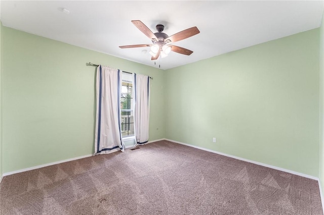 1206 Tru Ln, Rogers, AR 72756 - carpeted empty room featuring ceiling fan and baseboards