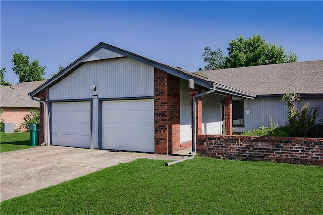 1004 W Linden St, Rogers, AR 72756 - view of front facade featuring a front yard, an attached garage, concrete driveway, and brick siding