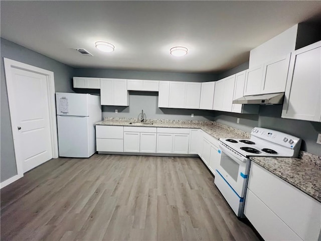 106 Phillips Ave, Huntsville, AR 72740 - kitchen featuring white appliances, under cabinet range hood, white cabinets, light wood-type flooring, and light stone counters