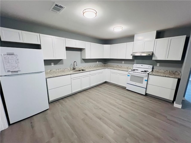 106 Phillips Ave, Huntsville, AR 72740 - kitchen featuring white appliances, under cabinet range hood, light wood-type flooring, white cabinetry, and light stone counters
