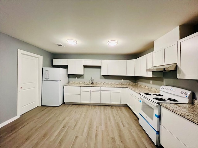 106 Phillips Ave, Huntsville, AR 72740 - kitchen with white appliances, under cabinet range hood, light wood finished floors, and white cabinetry