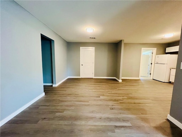 106 Phillips Ave, Huntsville, AR 72740 - spare room with baseboards and wood finished floors